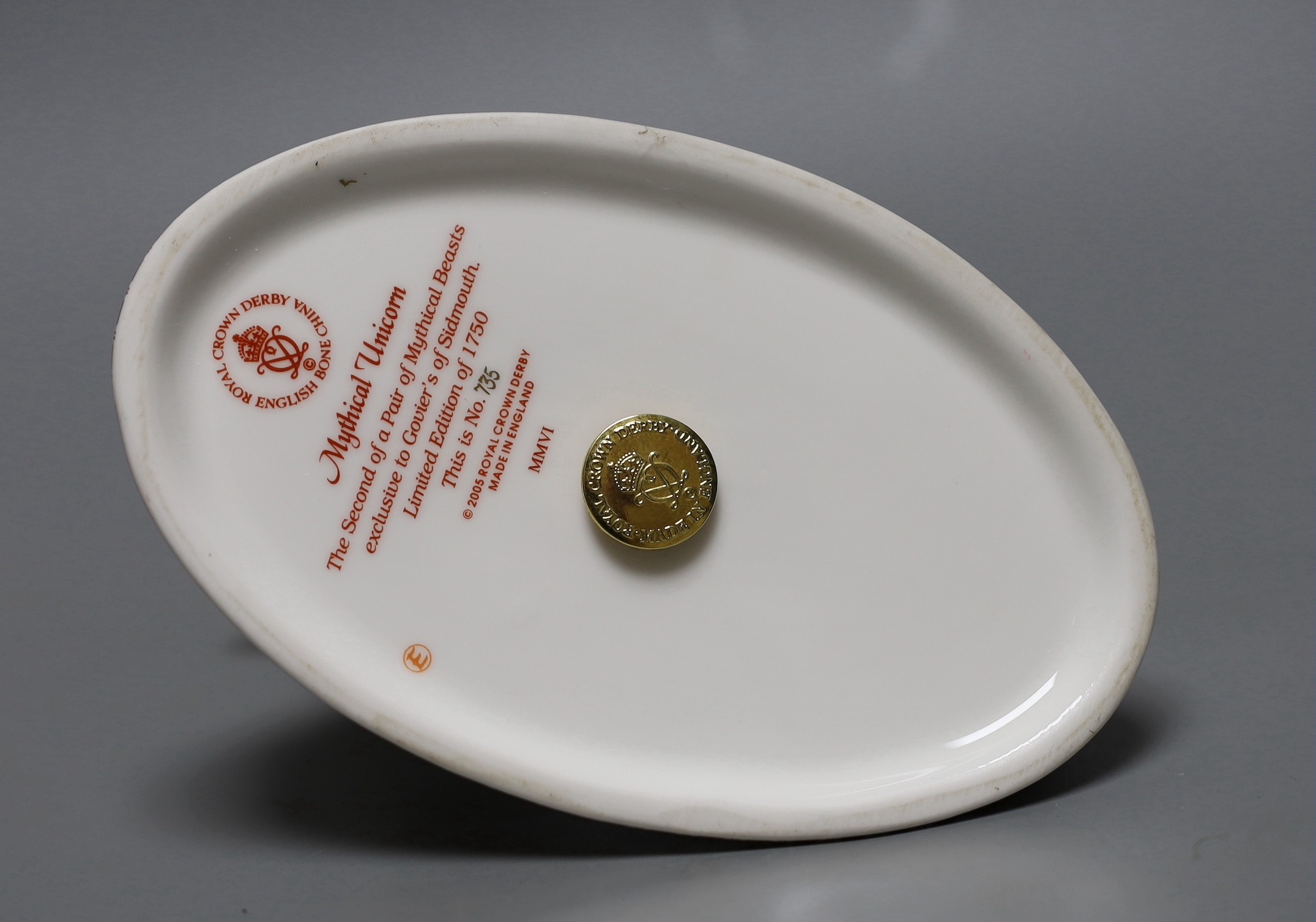 A limited edition Royal Crown Derby paperweight - Mythical Unicorn, gold stopper, boxed, no certificate, 735/1750
